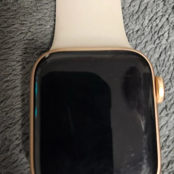 APPLE WATCH SE AND CHARGER (has a small scratch/crack) - Picture 4 of 4